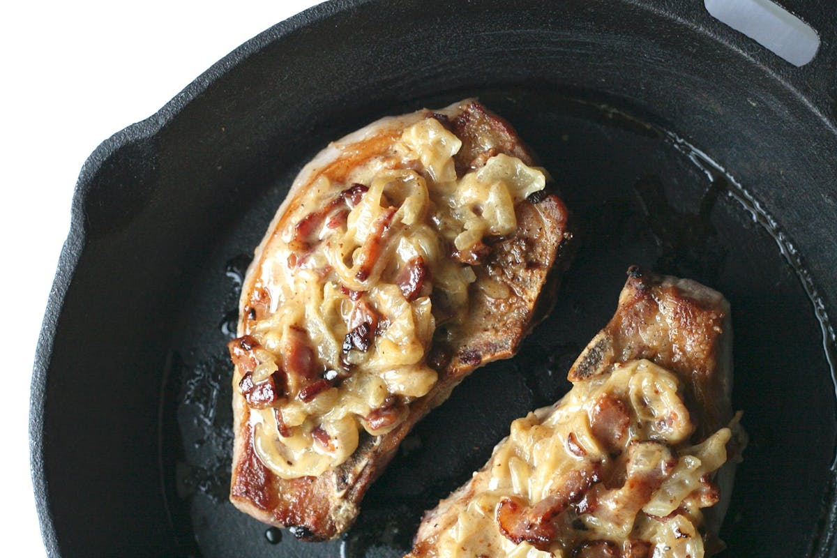 Caramelized Onion & Bacon Smothered Pork Chops