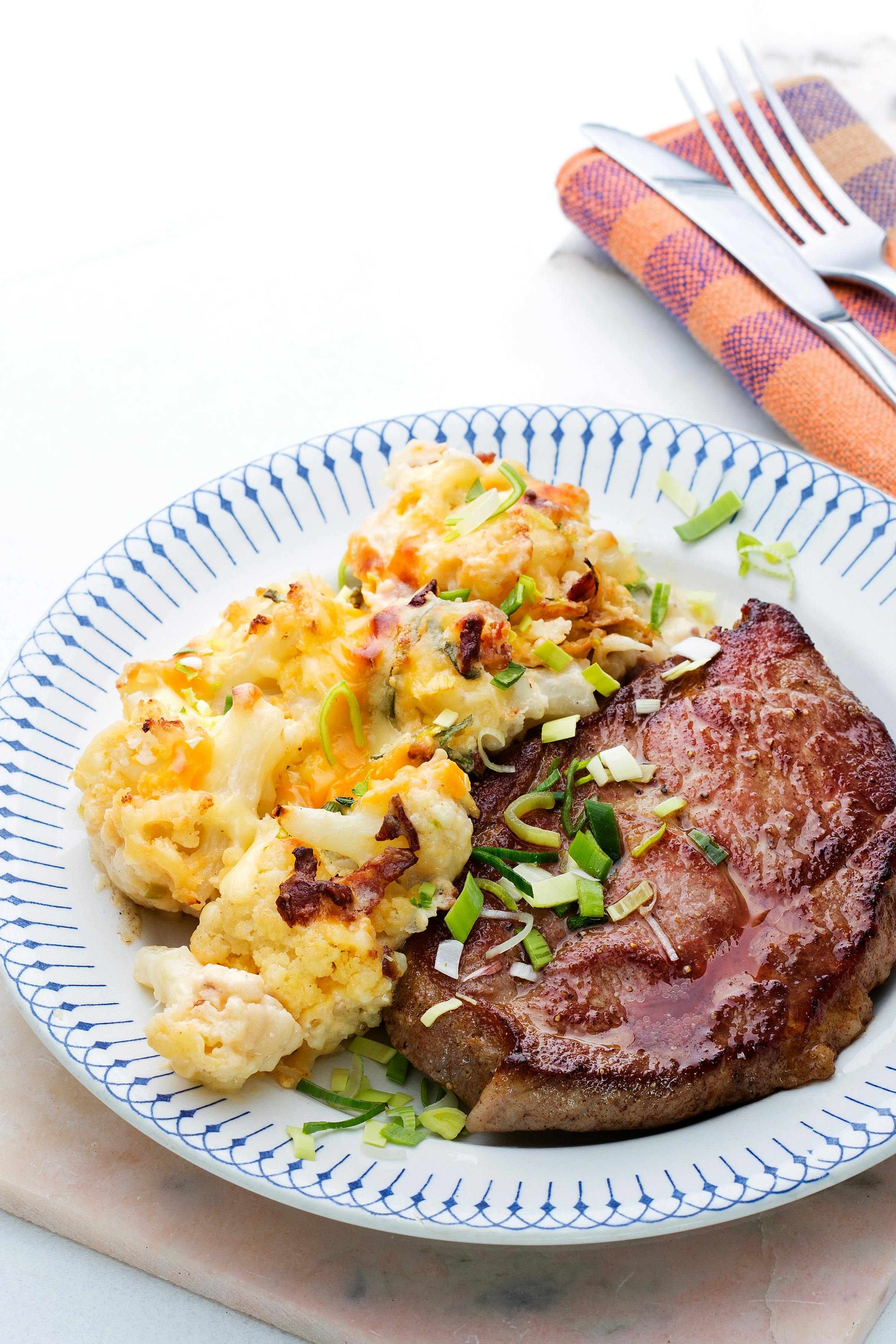 Low Carb Pork Chops With Cheesy Cauliflower Recipe Diet Doctor